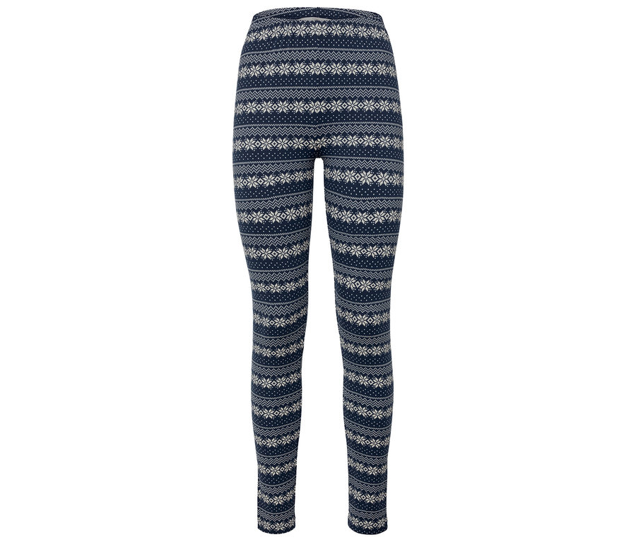 Leggings bleu marine avec motif de flocons de neige blancs.