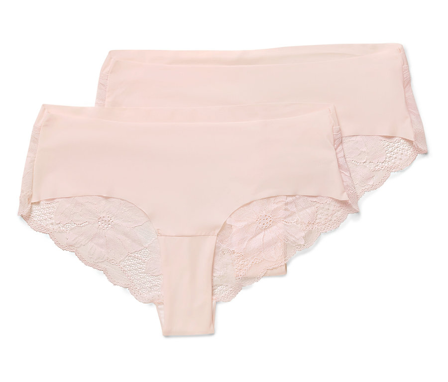 Deux culottes rose pâle avec de la dentelle superposées.