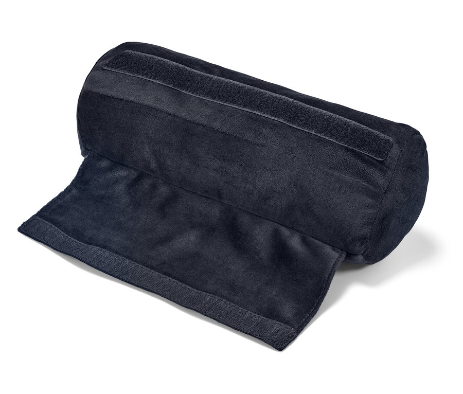 Oreiller cylindrique noir avec velcro ouvert.
