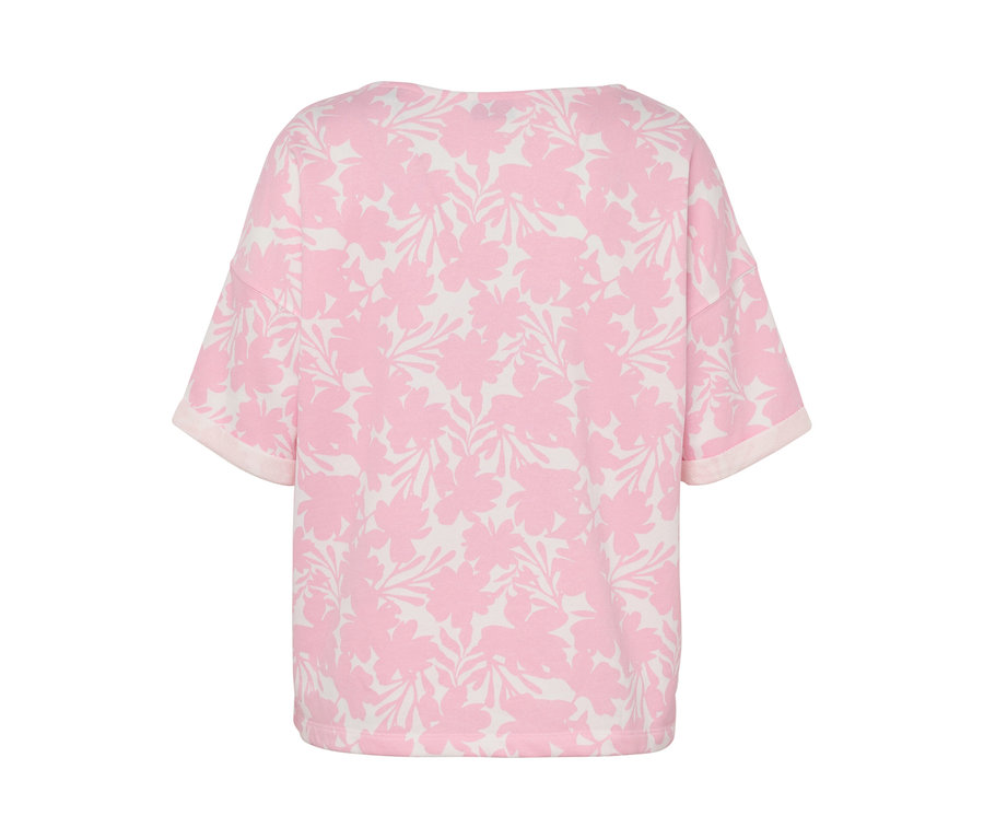 Sweat-shirt rose avec imprimé floral.