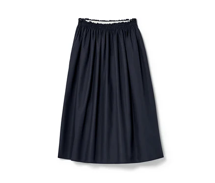Une jupe bleu marine NAH/STUDIO en coton bio avec une taille élastique.