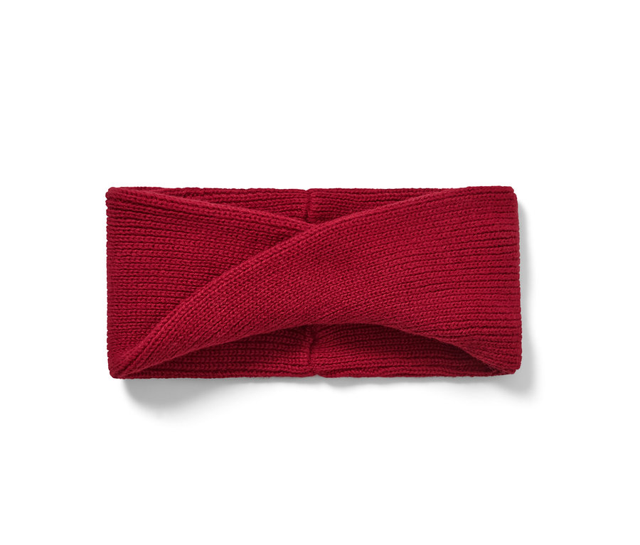 Bandeau en tricot rouge pour enfant sur fond blanc.