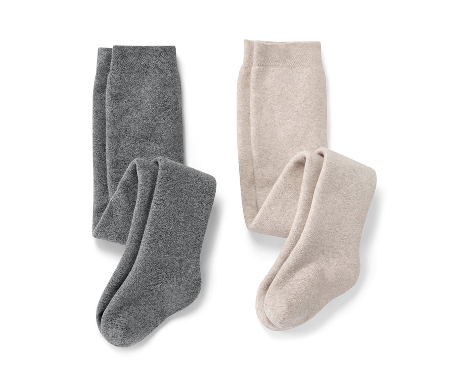 Deux collants thermiques chinés pour bébé et deux collants thermiques chinés pour enfant.