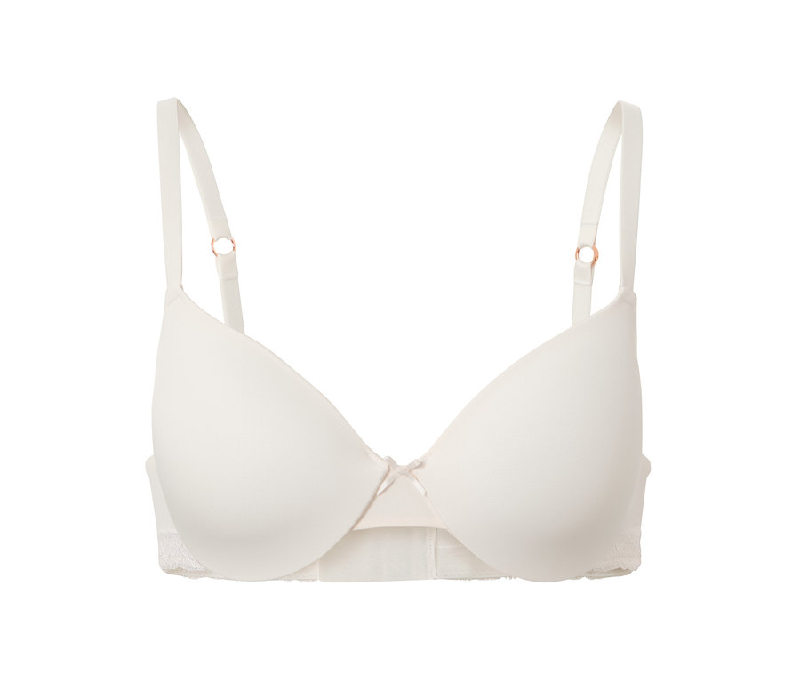 Soutien-gorge t-shirt crème avec un nœud au centre.