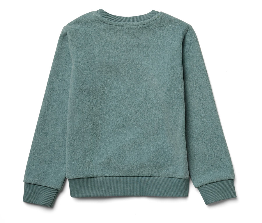 Gros plan d'un pull bleu clair.