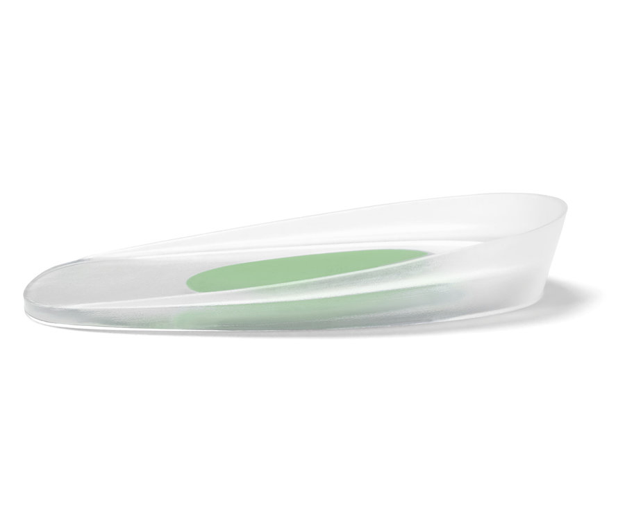 Semelle intérieure transparente avec insert ovale vert.