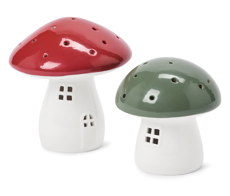 Deux photophores décoratifs en forme de champignons, un rouge et un vert, tous deux avec des ouvertures de fenêtres.