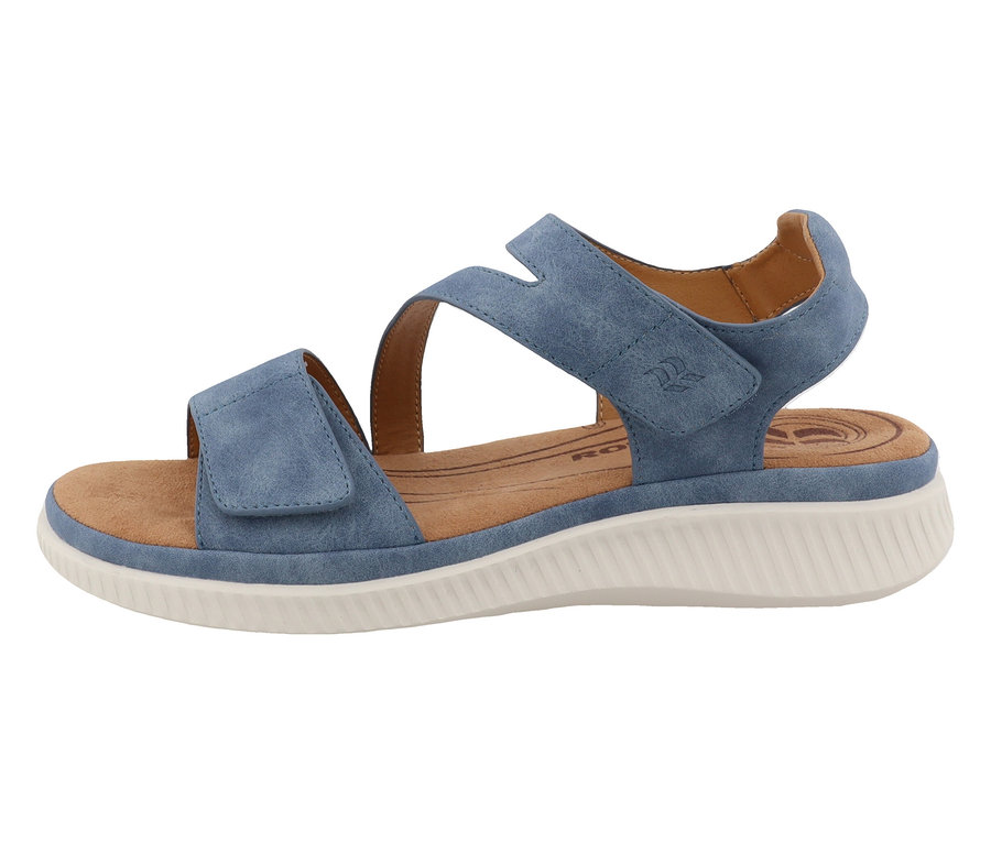 Une sandale Romika bleue avec assise plantaire marron et semelle blanche.
