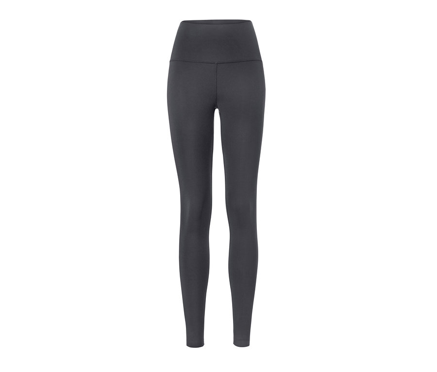 Collant de sport noir avec empiècement moulant.