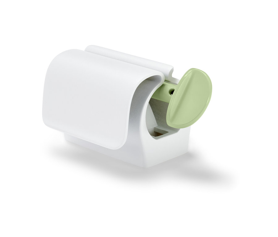 Presse-tube blanc avec clip pour le réfrigérateur.