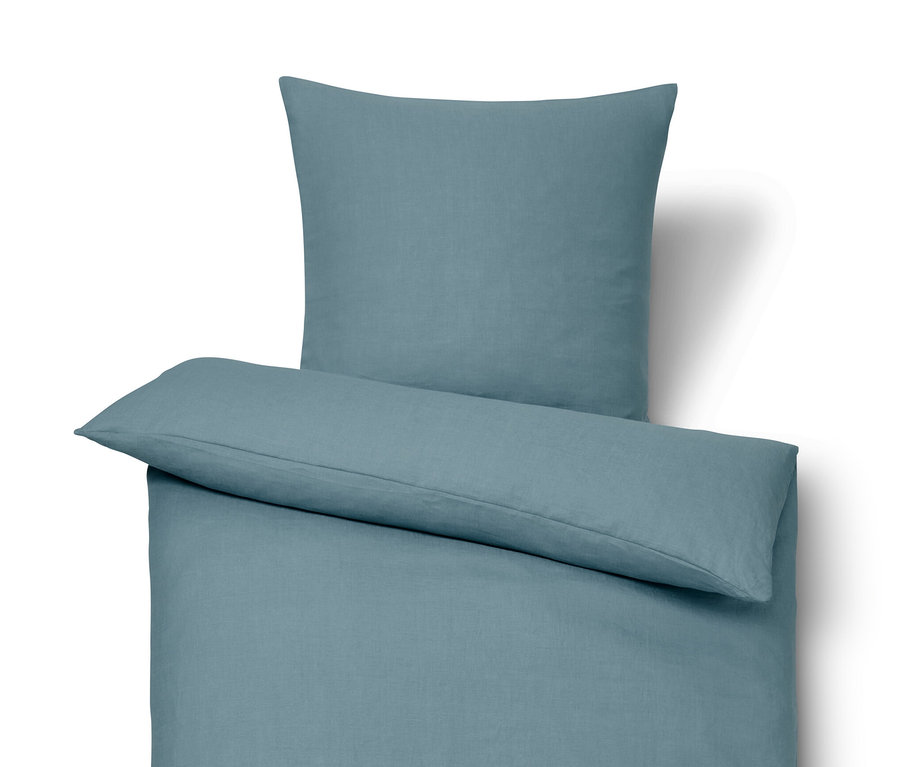 Parure de lit en lin bleu de taille standard et grande taille.