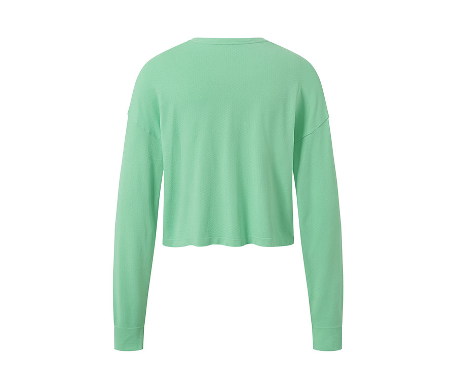 Vue arrière d'un t-shirt fonctionnel sans coutures vert clair.