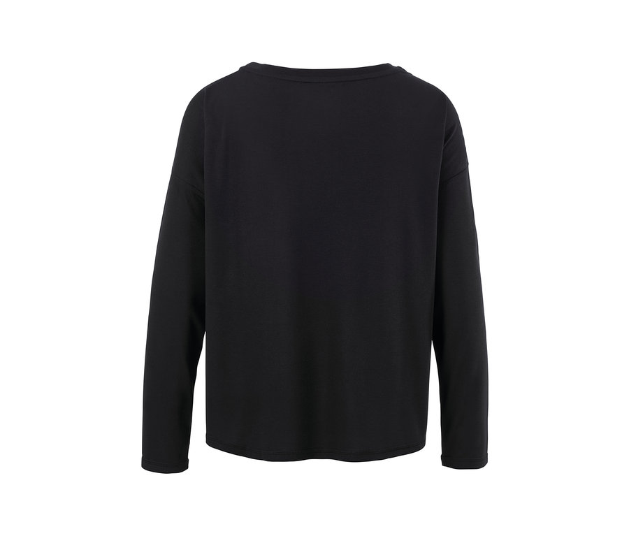 Vue détaillée d'un t-shirt de sport 2 en 1 noir.