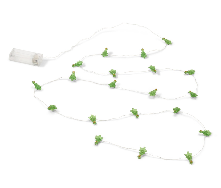 Guirlande lumineuse avec de petits arbres de Noël verts sur fond blanc.