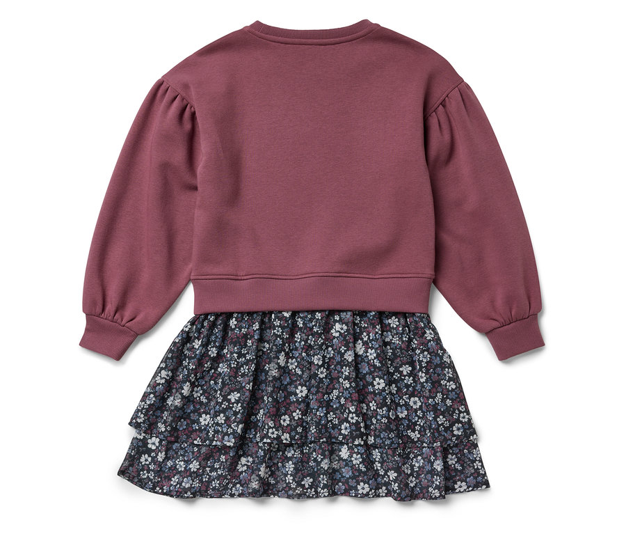 Robe à manches longues avec haut violet et jupe à fleurs.