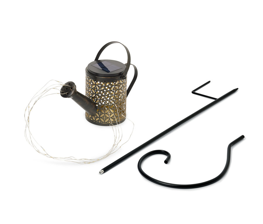 Lampe solaire « Arrosoir » avec fil lumineux et support noir.
