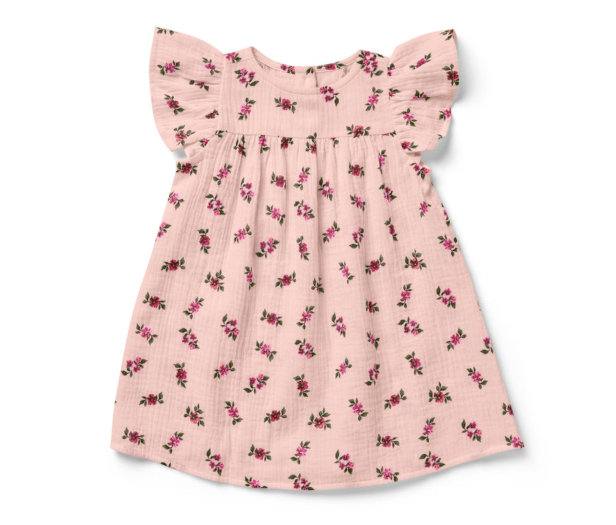 Robe en mousseline pour bébé avec motif floral.