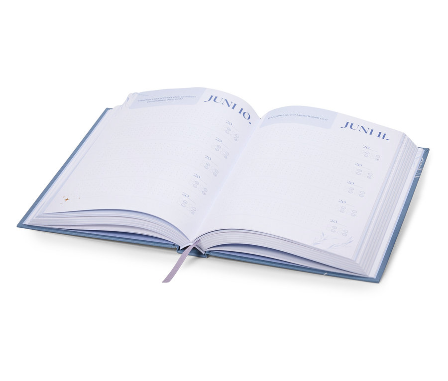 Agenda bleue ouverte avec les dates du 10 et 11 juin.