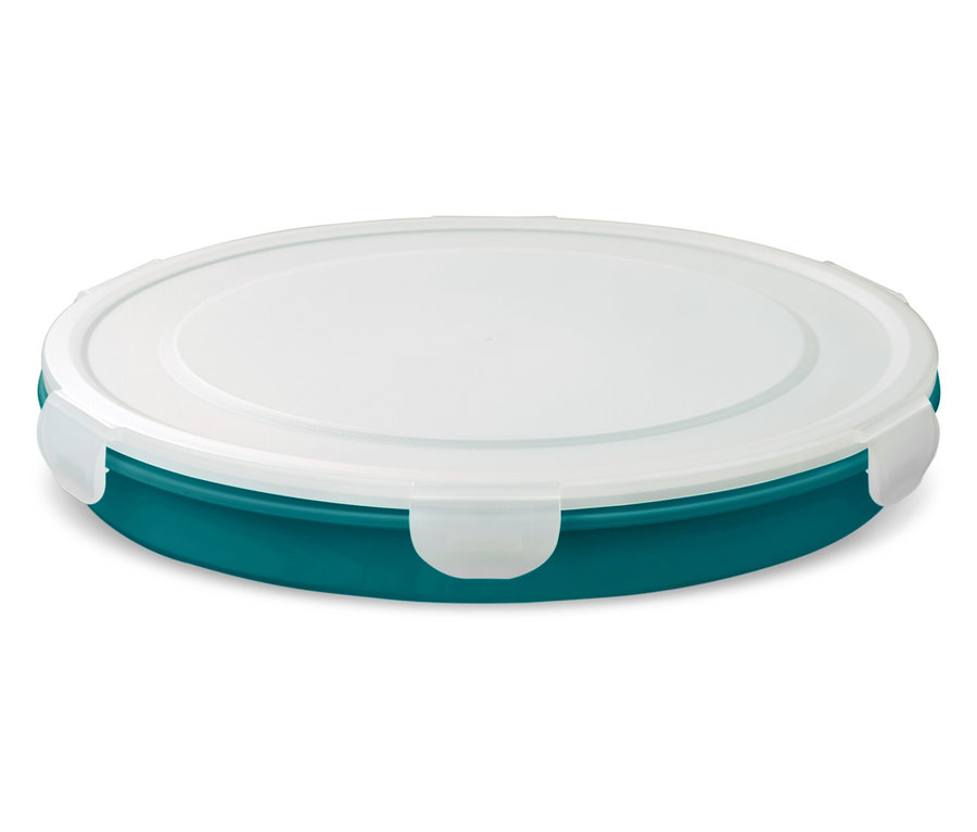 Un récipient rond turquoise avec un couvercle blanc et des fermetures à pression transparentes.