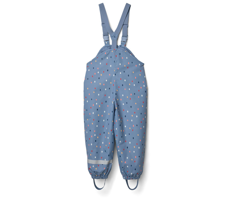 Pantalon de pluie bleu à pois multicolores et bandes réfléchissantes.