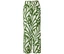 Pantalon vert avec motif de feuilles blanches.