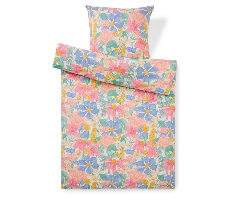 Ensemble de literie à motif floral, comprenant une taie d'oreiller et une housse de couette.