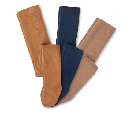 Trois paires de collants marron, bleu marine et marron clair sont superposées.
