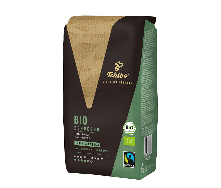Un paquet de café Vista Collection Bio Espresso en grains – 1x 1 kg. L'emballage est marron avec des inscriptions en vert et beige. Les logos bio et fairtrade figurent sur l'emballage.
