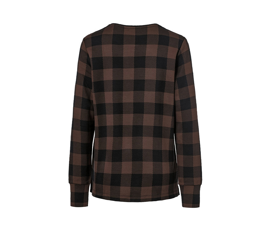 Vue détaillée d'un sweat-shirt à carreaux.