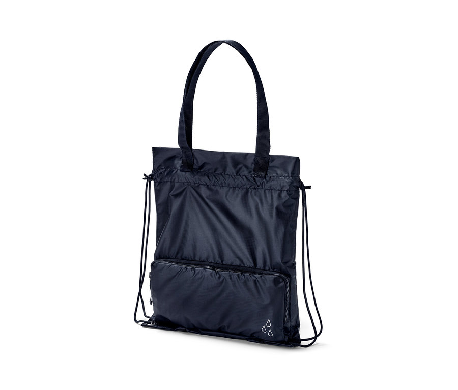 Sac à dos et tote bag 2 en 1 bleu marine avec poignées et cordon de serrage.