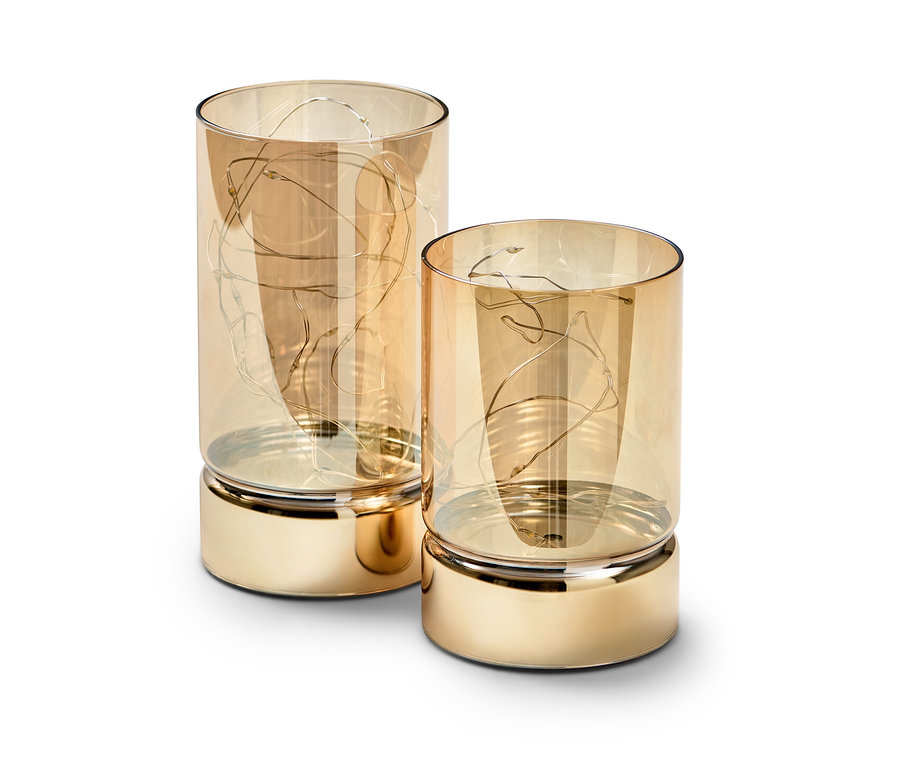 Deux photophores en verre à LED dorés.