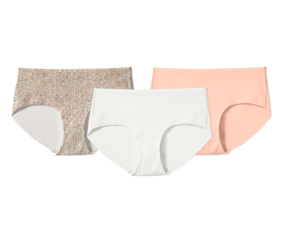 Trois culottes Magic Cut : à fleurs, blanche et pêche.
