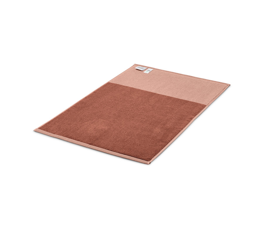 Vue détaillée du tapis de douche en Jacquard de haute qualité, rose-rouille.