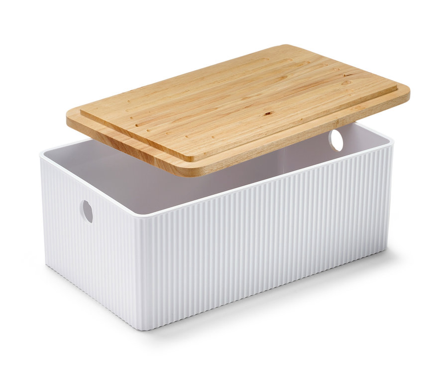 Boîte à pain blanche avec planche à découper en contreplaqué clair sur le dessus.