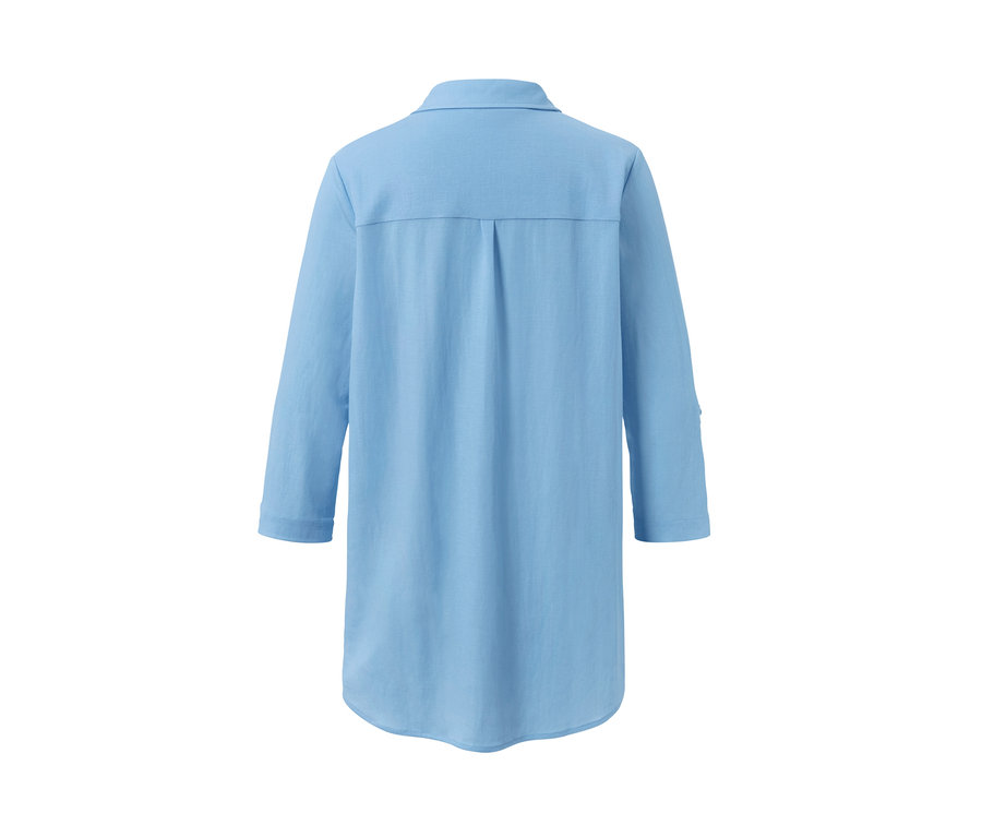 Chemisier bleu clair en jersey piqué vu de dos.