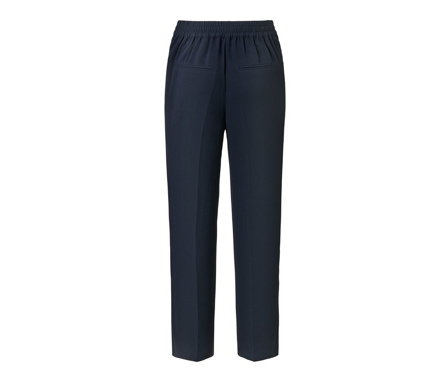 Pantalon tissé bleu foncé avec passepoil.