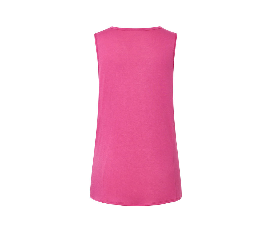 Vue détaillée d'un débardeur de sport fuchsia d'un ensemble deux pièces.