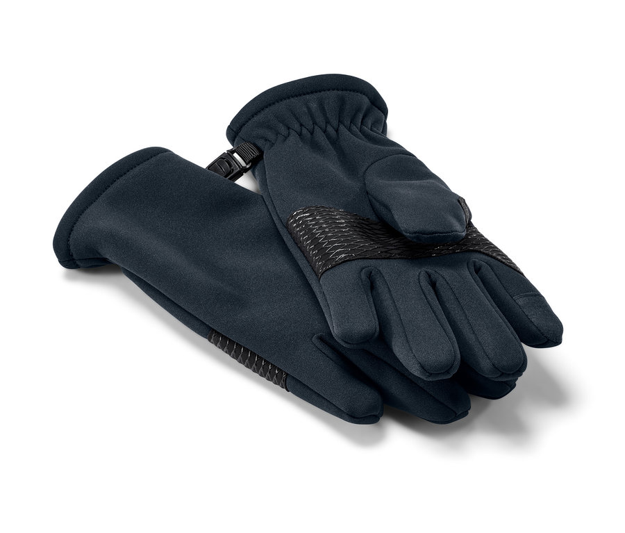 Deux gants en softshell pour enfant sont posés l'un sur l'autre.