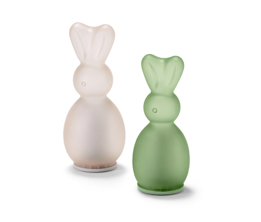 Deux lapins à LED, un rose clair et un vert.