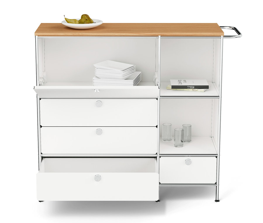 Meuble en métal « CN3 » blanc avec plateau en bois, un abattant, quatre tiroirs et des étagères.