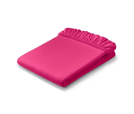 Drap-housse en jersey rose vif, taille normale et drap-housse en jersey, taille double, pliés.