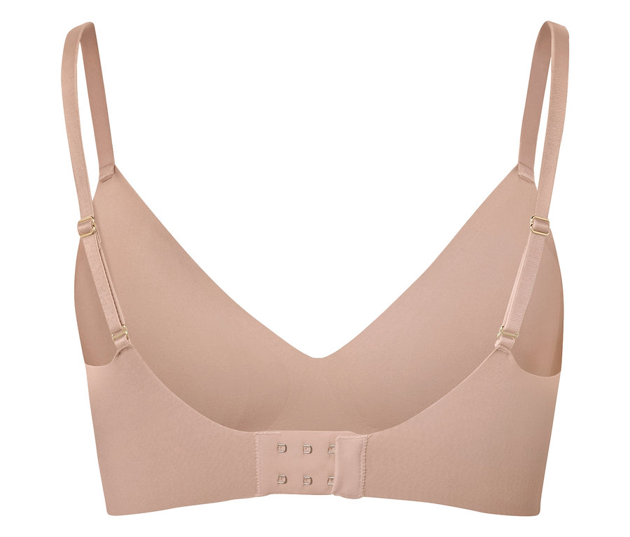 Vue arrière d'un soutien-gorge couleur chair avec bretelles réglables et fermeture à agrafes.