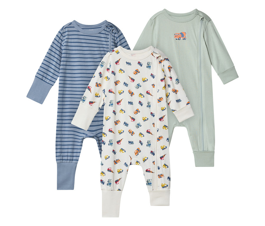 Trois pyjamas pour bébé, pelleteuse, avec fermeture éclair : un bleu rayé, un blanc avec motif de pelleteuse et un vert clair avec application de pelleteuse.