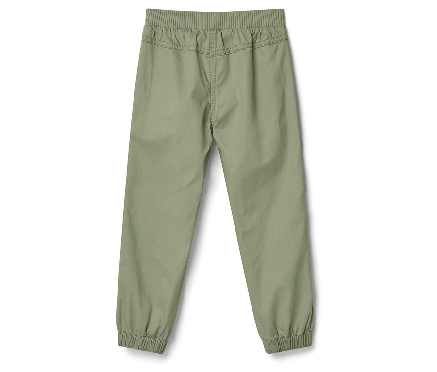 Pantalon vert olive clair avec taille élastique et chevilles côtelées, posé sur un fond blanc.