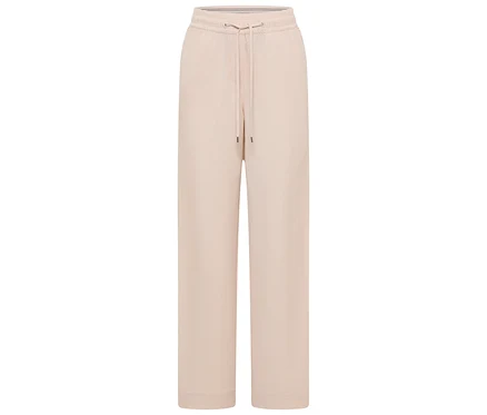 Pantalon beige ample avec cordon de serrage sur fond blanc.