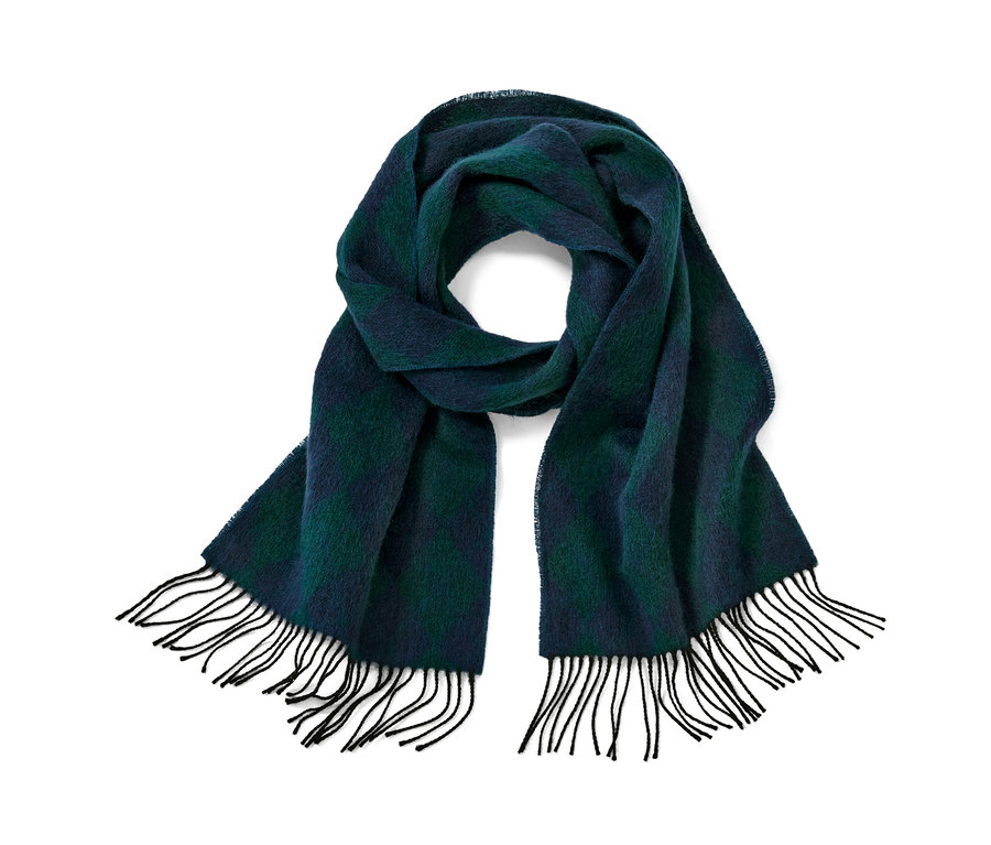 Une écharpe en laine bleu et vert avec des franges.