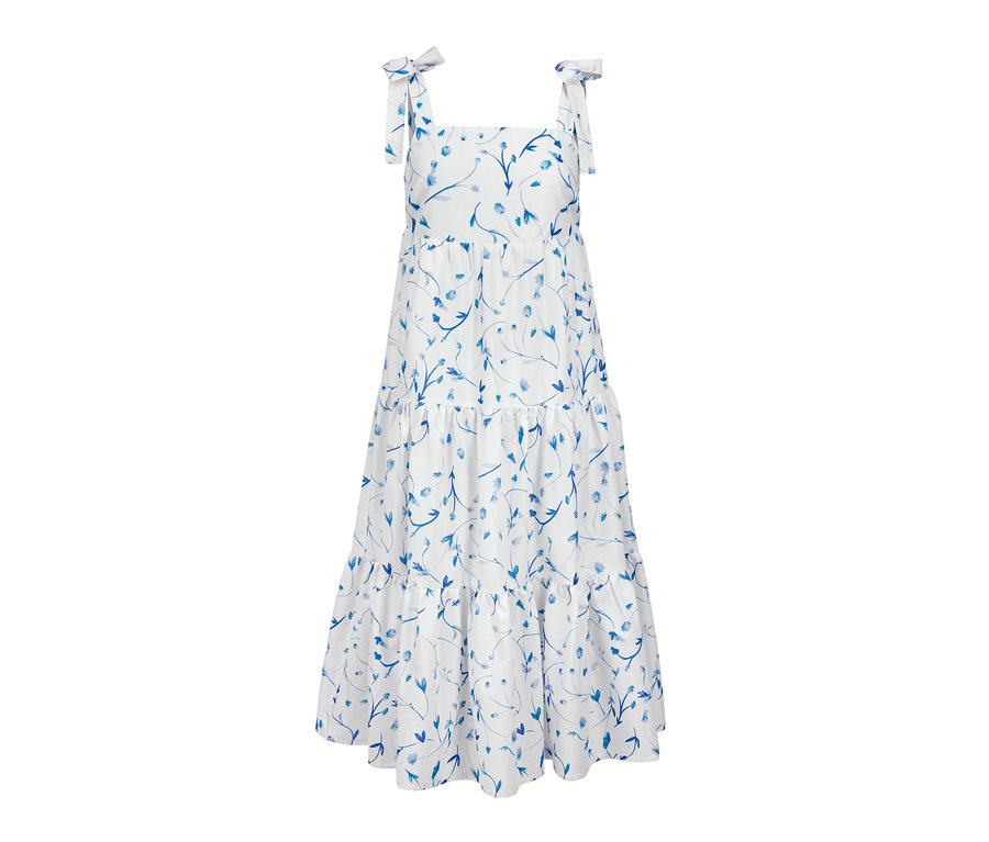 Robe tissée imprimée blanche avec motif floral bleu.
