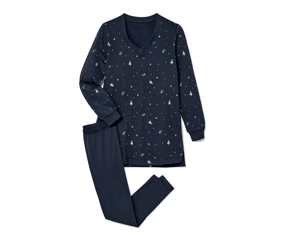 Pyjama avec legging bleu marine à imprimé de Noël avec des rennes, des étoiles et des arbres.