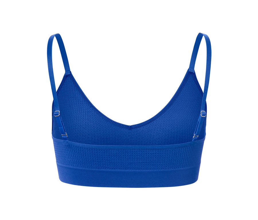 Vue détaillée de dos d'une brassière sans coutures bleue avec structure.