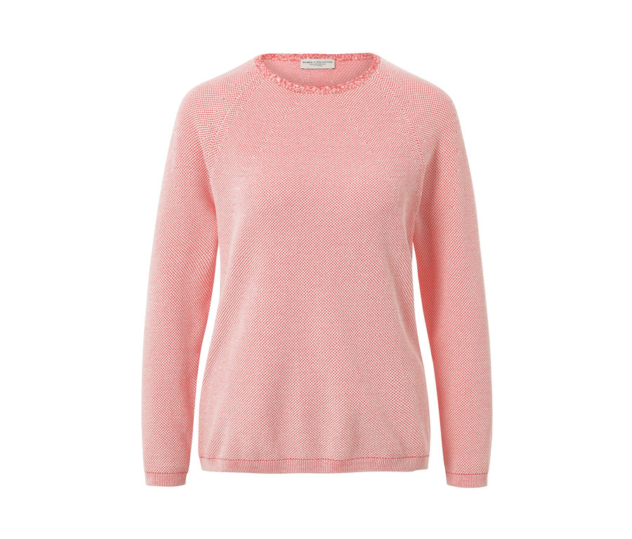 Pull en maille rose.